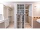 Bathroom with a walk-in shower and a built-in vanity at 1177 Paseo Del Mar # D, Casselberry, FL 32707