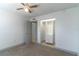 Bedroom featuring a ceiling fan and a closet with built-in storage at 1177 Paseo Del Mar # D, Casselberry, FL 32707