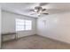Cozy bedroom with a ceiling fan and a window at 1177 Paseo Del Mar # D, Casselberry, FL 32707