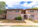 Charming two-story condo showcasing well-kept grounds and a welcoming entrance at 1177 Paseo Del Mar # D, Casselberry, FL 32707