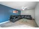Comfortable living room featuring a stylish leather sectional couch and neutral carpet at 1177 Paseo Del Mar # D, Casselberry, FL 32707
