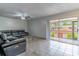 Bright living room with a large sliding glass door leading to a balcony with beautiful view at 1177 Paseo Del Mar # D, Casselberry, FL 32707