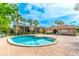 Sparkling community pool with cozy lounging area and access to community building at 1177 Paseo Del Mar # D, Casselberry, FL 32707