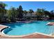 Spacious community pool with multiple access points and plenty of room for relaxing at 1201 S Beach Cir, Kissimmee, FL 34746