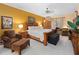 Comfortable primary bedroom with a ceiling fan, ample closet space, and cozy furnishings at 1319 Castleport Rd, Winter Garden, FL 34787