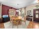 Elegant dining room with wood table, seating for six, and tasteful decor at 1319 Castleport Rd, Winter Garden, FL 34787