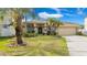 Charming single-story home with well-maintained landscaping and a two-car garage at 1319 Castleport Rd, Winter Garden, FL 34787