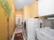 Laundry room with washer, dryer, and plenty of storage at 1319 Castleport Rd, Winter Garden, FL 34787
