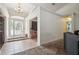 Inviting foyer with tile flooring and decorative front door, leading into the home's living spaces at 13780 Sw 78Th Pl, Dunnellon, FL 34432