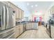Functional kitchen with modern appliances, ample counter space, and bright, airy atmosphere at 13780 Sw 78Th Pl, Dunnellon, FL 34432