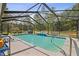 Inviting screened-in pool area, perfect for relaxation and outdoor enjoyment at 13780 Sw 78Th Pl, Dunnellon, FL 34432