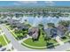 Aerial view of the community highlighting the lake and surrounding homes at 14545 Braddock Oak Dr, Orlando, FL 32837