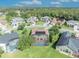 Aerial view of backyard showing pool and screened in lanai with surrounding neighborhood at 14545 Braddock Oak Dr, Orlando, FL 32837