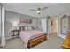 The primary bedroom has neutral tones, with plenty of natural light and storage space at 14545 Braddock Oak Dr, Orlando, FL 32837