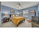 Comfortable bedroom with stylish decor, natural light, and a cozy atmosphere at 14545 Braddock Oak Dr, Orlando, FL 32837