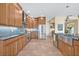 Well-appointed kitchen featuring wooden cabinets, stainless steel appliances, and generous counter space at 14545 Braddock Oak Dr, Orlando, FL 32837