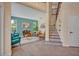 Inviting open-concept living room with large windows, comfortable seating, and stylish decor at 14545 Braddock Oak Dr, Orlando, FL 32837