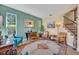 Inviting living room with stairs, stylish decor, natural light, and comfortable seating arrangement at 14545 Braddock Oak Dr, Orlando, FL 32837