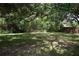 The spacious, grassy backyard is surrounded by mature trees, offering natural shade and seclusion at 15349 Oak Apple Ct # B, Winter Garden, FL 34787