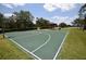 Community basketball court with gazebo and tennis court in the background at 15349 Oak Apple Ct # B, Winter Garden, FL 34787
