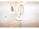 Bathroom featuring vanity sink, mirror, vanity lighting, and tile flooring at 15349 Oak Apple Ct # B, Winter Garden, FL 34787