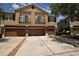 Townhouse exterior features a multi-car driveway, attached garages, and small balconies, with neutral color scheme at 15349 Oak Apple Ct # B, Winter Garden, FL 34787