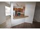 Open kitchen view with stainless steel sink, countertop, and ample lighting with white wall paint at 15349 Oak Apple Ct # B, Winter Garden, FL 34787