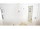 All-white shower stall featuring integrated shelving and an adjustable shower head at 15349 Oak Apple Ct # B, Winter Garden, FL 34787