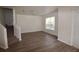 Bright living room features sleek flooring, neutral walls, and a staircase leading to the upper level at 15349 Oak Apple Ct, Winter Garden, FL 34787