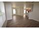 Open-concept living space features stylish floors, blending seamlessly into a dining and kitchen area at 15349 Oak Apple Ct, Winter Garden, FL 34787
