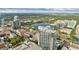 Beautiful aerial view of the property showcasing the lake, surrounding greenery and neighborhood at 155 S Court Ave # 1608, Orlando, FL 32801