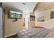 Comfortable bedroom with a mounted TV and en-suite bathroom access at 155 S Court Ave # 1608, Orlando, FL 32801