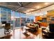 Inviting living room featuring modern decor, hardwood floors, and city views at 155 S Court Ave # 1608, Orlando, FL 32801