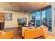 Bright living room with floor-to-ceiling windows and a comfortable seating area at 155 S Court Ave # 1608, Orlando, FL 32801