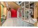 Modern lobby with sleek flooring, a decorative ceiling, art accents, and large glass windows at 155 S Court Ave # 1608, Orlando, FL 32801