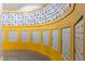 Bright yellow mail room with a series of mailboxes and a modern architectural design at 155 S Court Ave # 1608, Orlando, FL 32801
