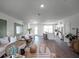 Open living space with kitchen, dining area, and living room, perfect for modern living at 1558 Dalehurst Ln, Kissimmee, FL 34744