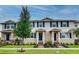 Charming townhomes with manicured lawns and tasteful landscaping create welcoming curb appeal at 1562 Dalehurst Ln, Kissimmee, FL 34744