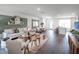 Spacious open-concept layout connects the kitchen, dining area and living room at 1562 Dalehurst Ln, Kissimmee, FL 34744
