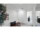 Bright hallway with a decorative bench and ample closet space at 1566 Dalehurst Ln, Kissimmee, FL 34744