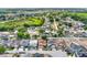 A neighborhood aerial showcasing lush greenery and well-maintained homes at 1744 Pine Ridge Dr, Davenport, FL 33896