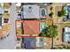 Aerial view of the property highlighting the pool and surrounding landscape at 1744 Pine Ridge Dr, Davenport, FL 33896