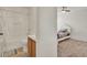 Bathroom featuring a tub, shower, and vanity next to a bedroom at 1744 Pine Ridge Dr, Davenport, FL 33896