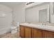 Bathroom featuring a double vanity and tile flooring at 1744 Pine Ridge Dr, Davenport, FL 33896