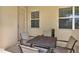 Outdoor patio with seating, perfect for relaxing or entertaining guests at 1744 Pine Ridge Dr, Davenport, FL 33896