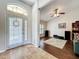 Inviting foyer with tile flooring, leaded glass door, transom window, and decorative wreath at 1846 Branchwater Trl, Orlando, FL 32825