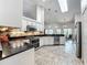 Updated kitchen with stainless steel appliances, granite countertops, and an adjoining breakfast nook at 1846 Branchwater Trl, Orlando, FL 32825