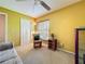A cozy sitting room featuring a comfortable rocking chair near a bright window and closet at 1846 Branchwater Trl, Orlando, FL 32825