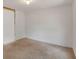 A bright bedroom with carpet and an electrical outlet at 2045 South St, Oviedo, FL 32765