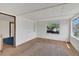 Bedroom with wood floors and a window at 2045 South St, Oviedo, FL 32765